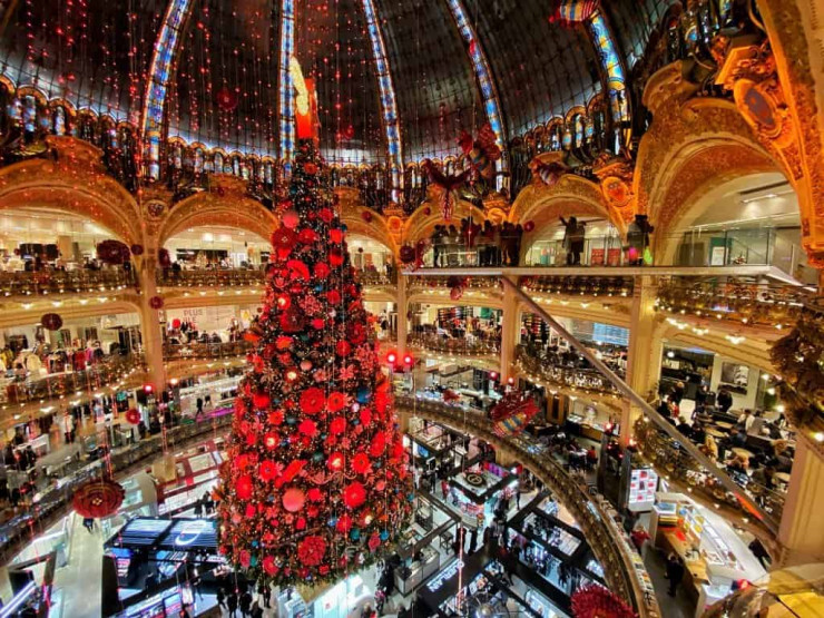 Huge Christmas tree at Galerie Lafayette in Paris, France.
