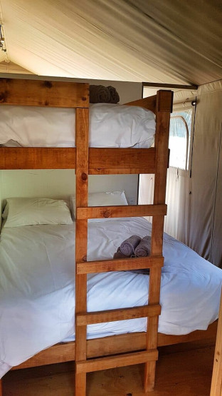 Glamping bed at AfriCamps Pat Busch, South Africa