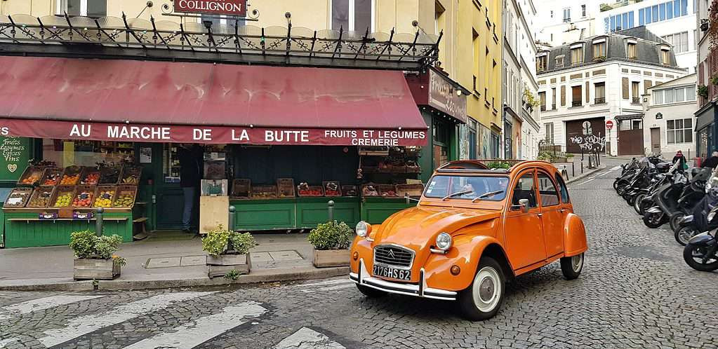 2CV tour through Montmartre, Paris. Discover the lovely unusual streets around Montmartre in a typical french car.