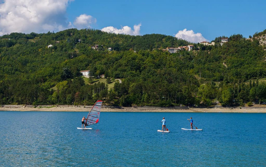 Lake Suviana, where the sailing centre can offer you SUP, kayaking, wind-surfing or sailing.